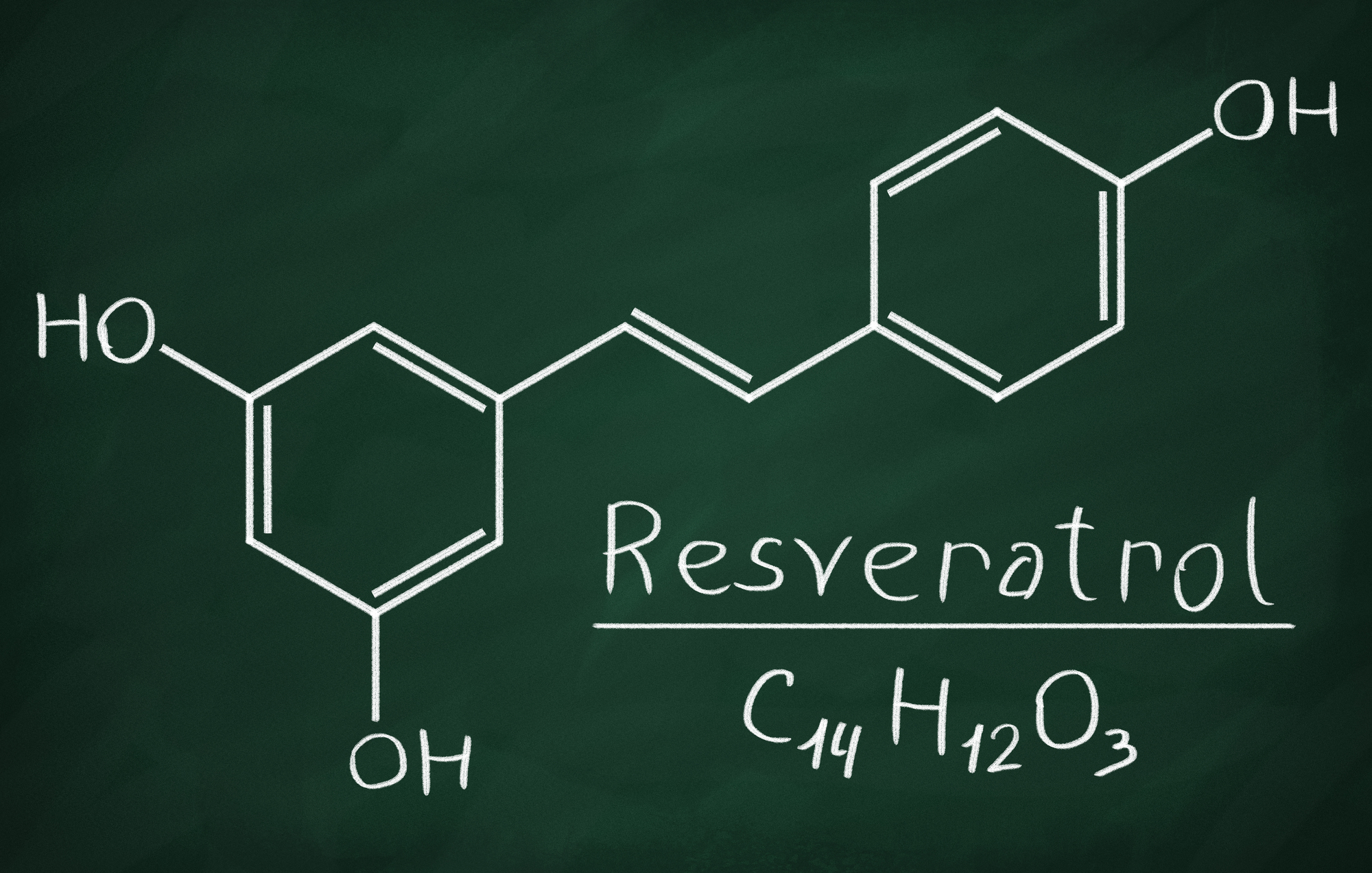 The chemical structure of resveratrol written on a chalkboard.